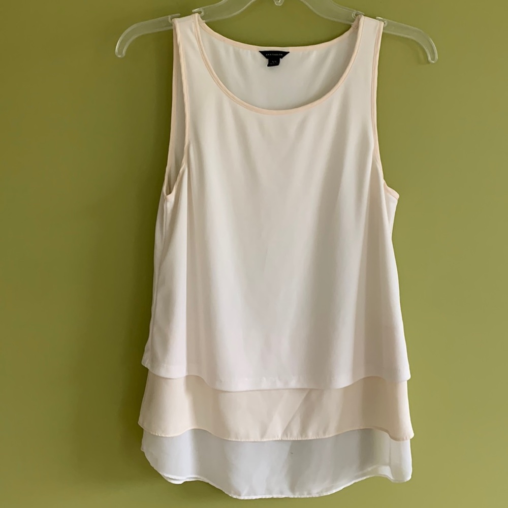Ann Taylor cream shell with multi layers of chiffon.